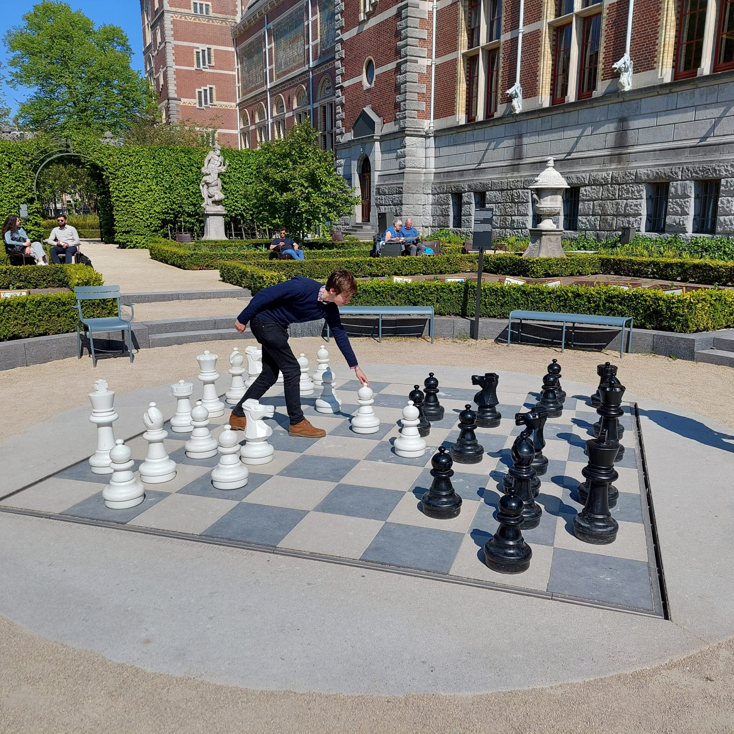 Frazer Graham playing Chess on an outside chess board.